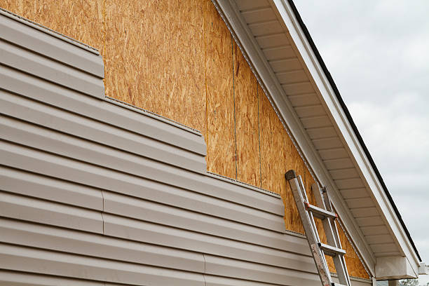 Professional Siding Installation technician working in Southlake, TX